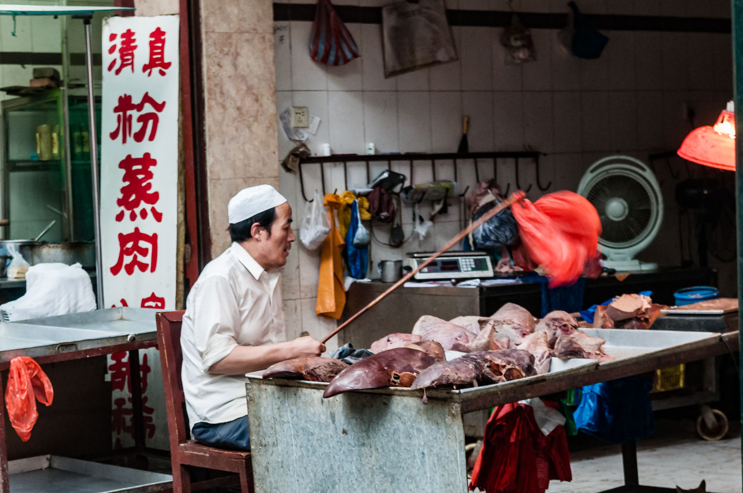 CN090951-Meat-seller-in-the-Xian-muslim-area.jpg