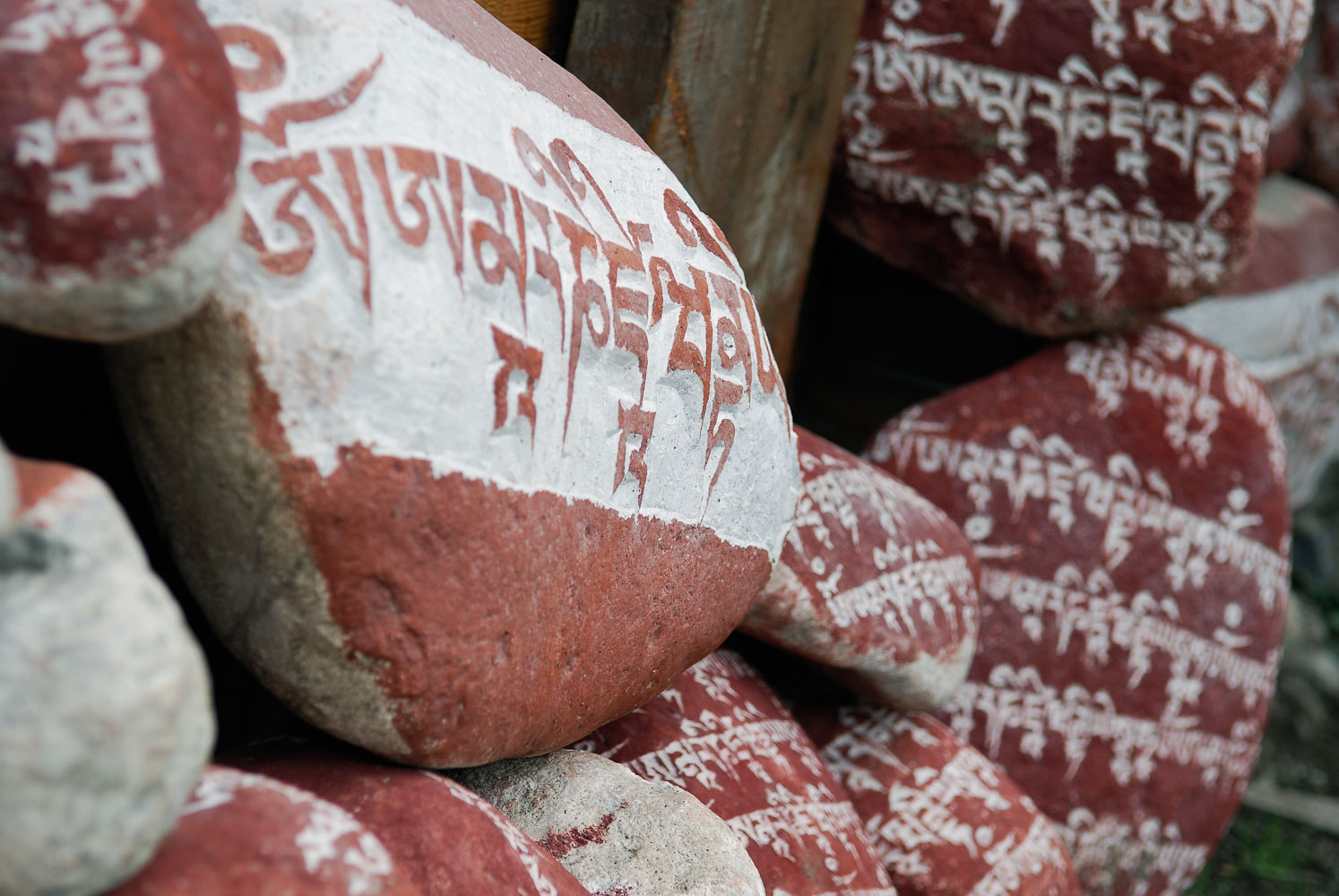 CN070619-Pomi-Mani-stones-en-route-to-the-monastery-.jpg