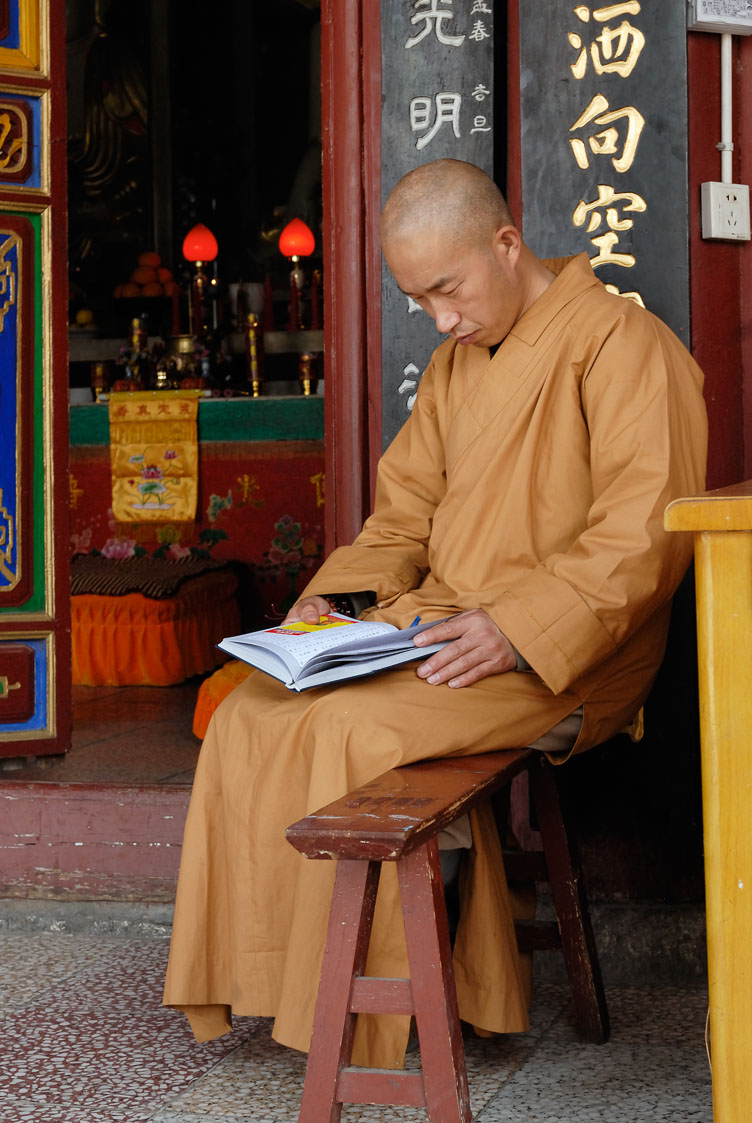 CN070093-Y-Dali---Monk-reading-Guanyin-Temple.jpg