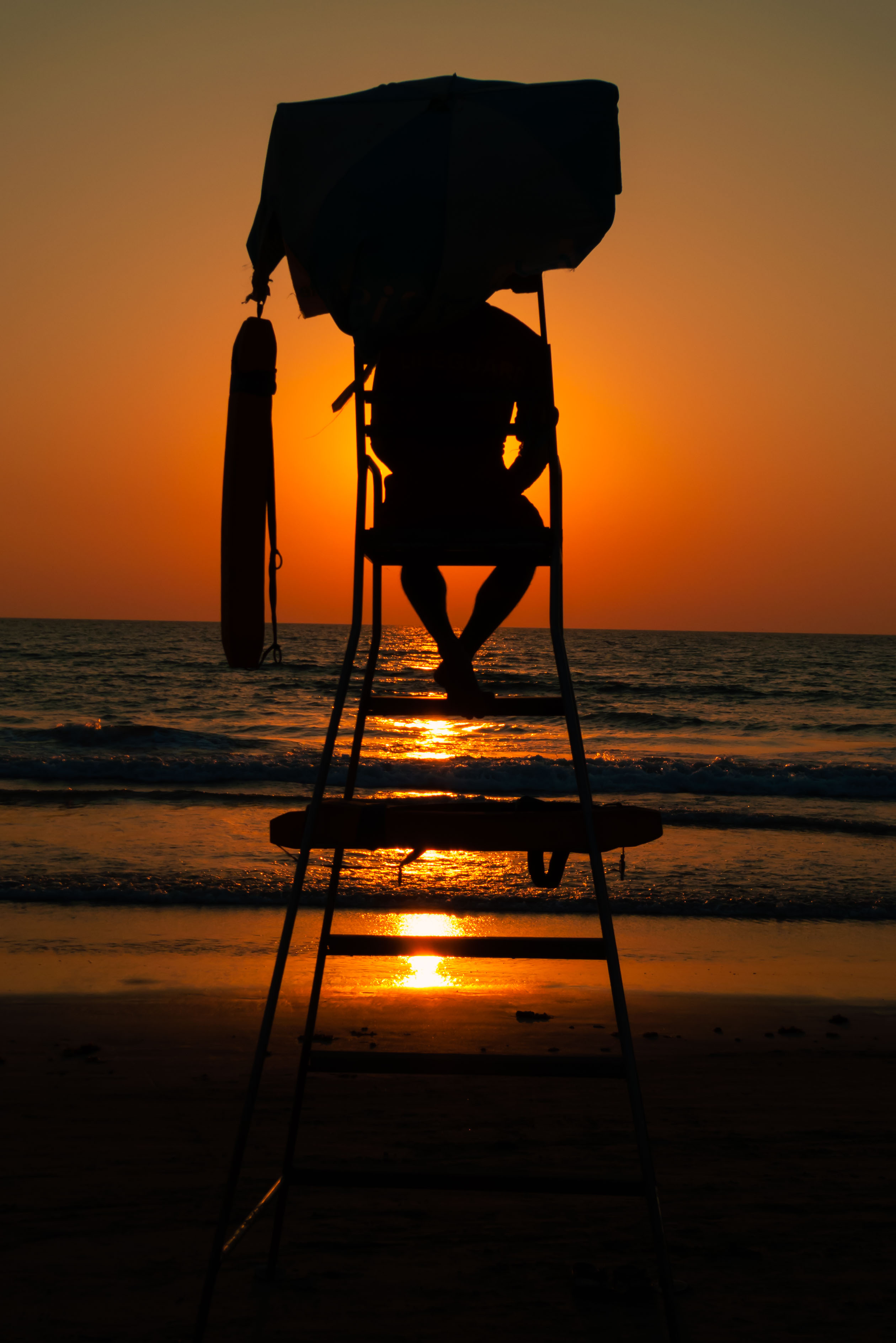 IN110213-Arambol-lifeguard-at-dusk.jpg