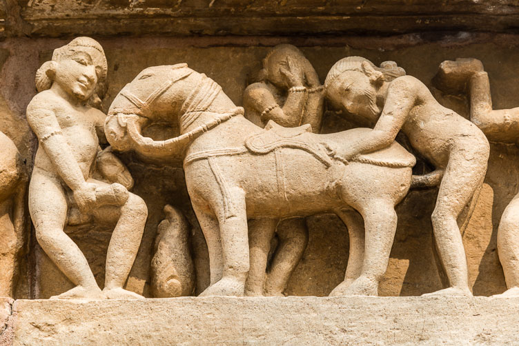IN141061-Erotic-sculpture-at-the-Lakshmana-Temple-in-Khajurao.jpg
