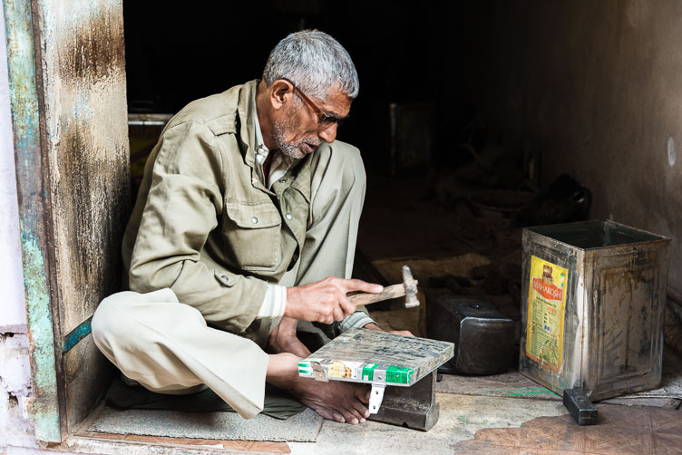 IN140529E-Making-tin-boxes-with-hands-and-feet.jpg