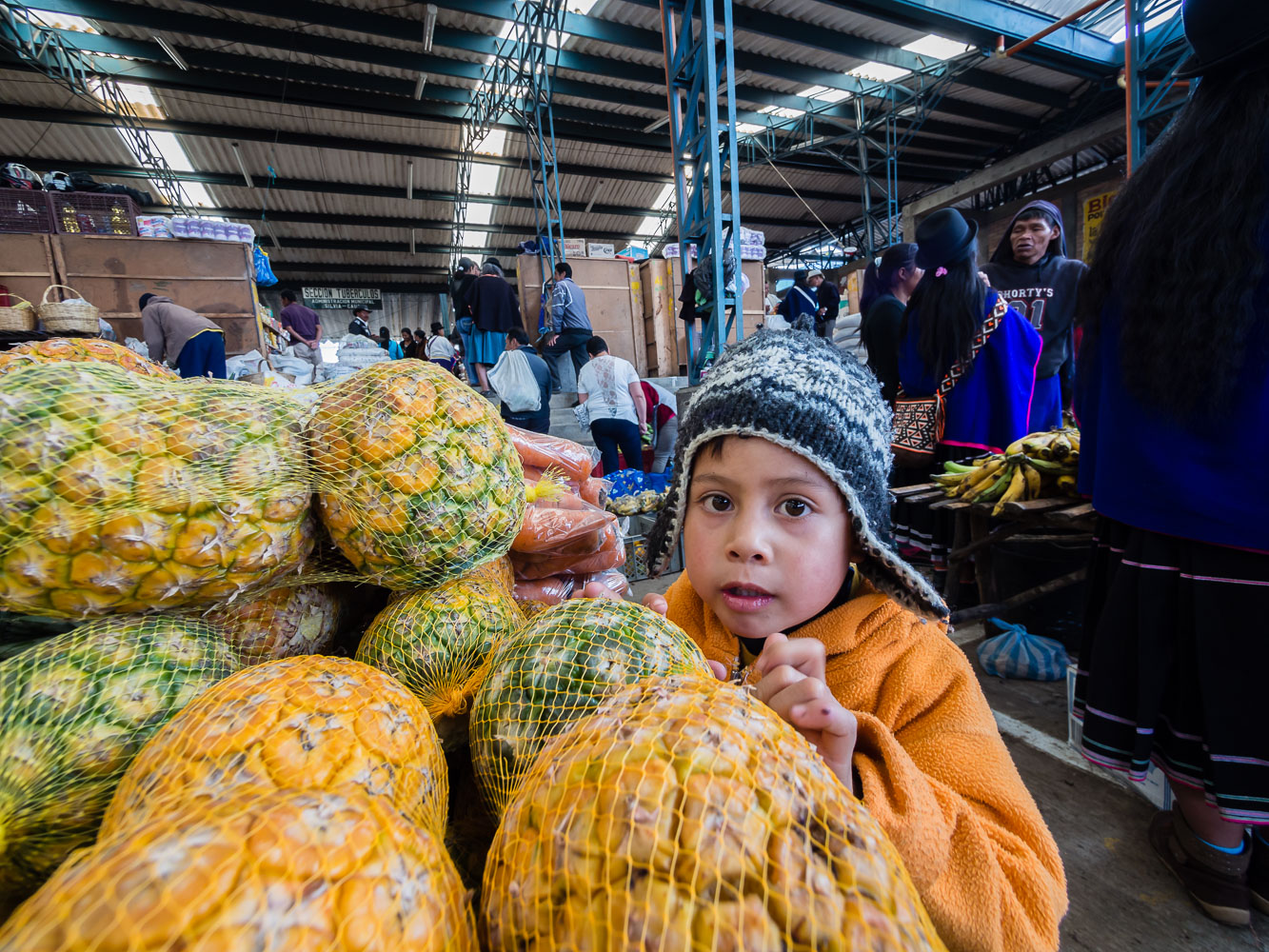 CO150632E-Silva-Boy-at-the-market.jpg